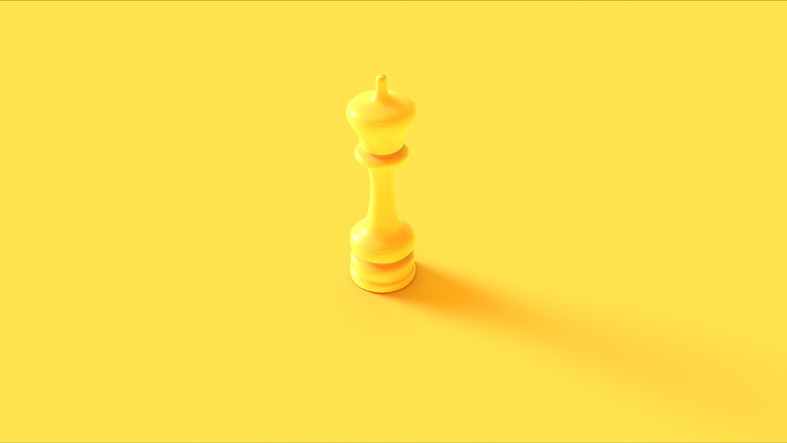 king chess piece on yellow background