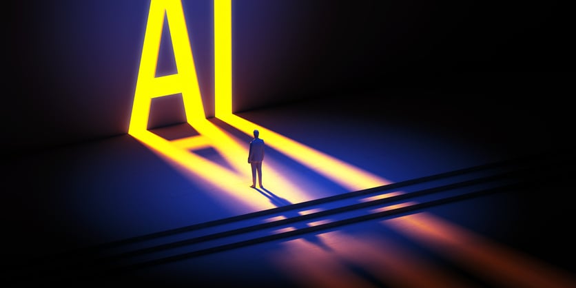 AI. Machine Learning Concept. Neon AI Sign reflecting a Silhouette of a man 