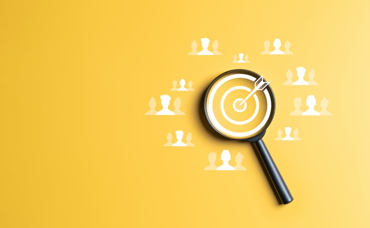 Customer group icons around the magnifying glass with target dartboard icon on a yellow background